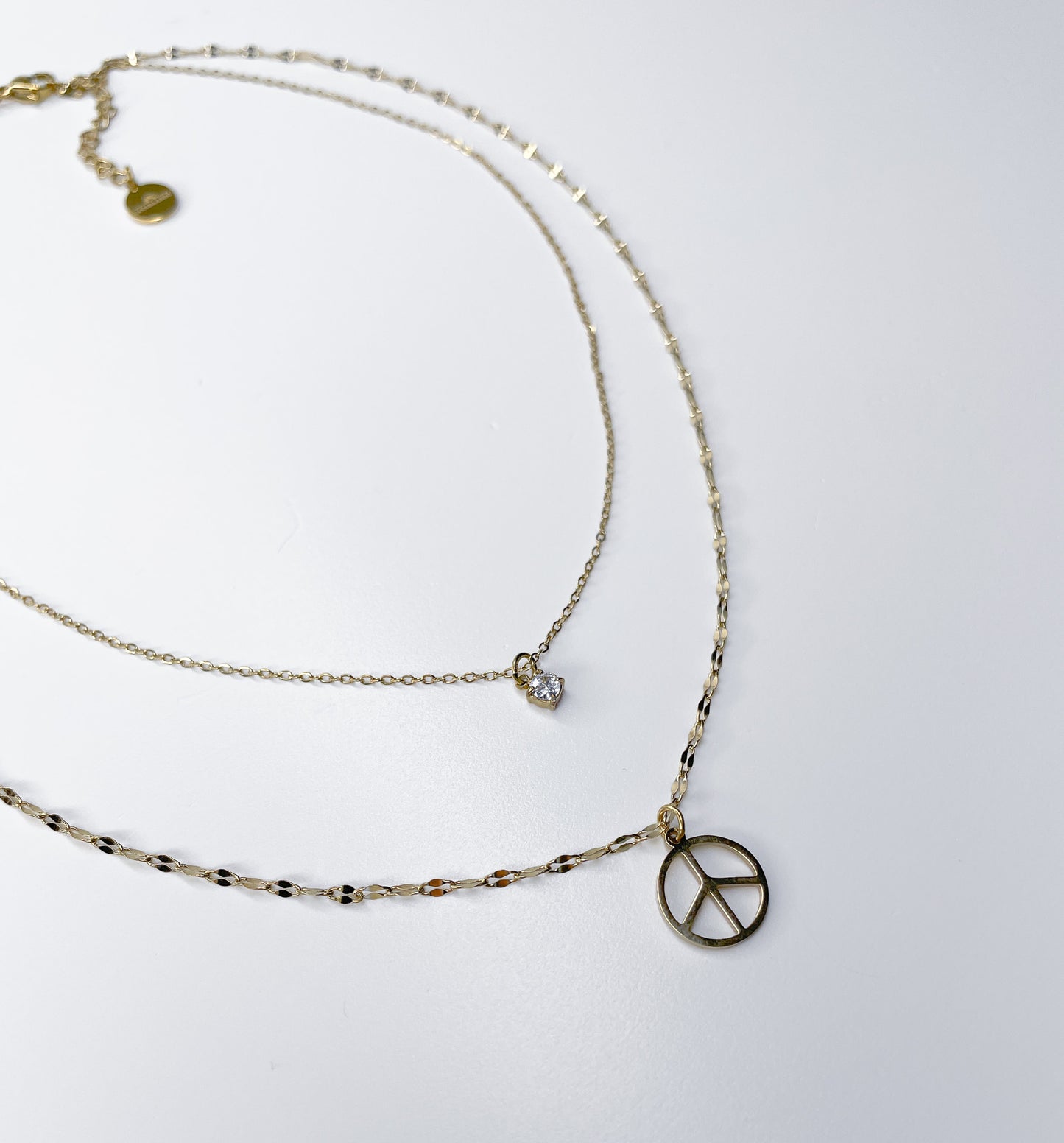 <tc>Peace Necklace</tc>